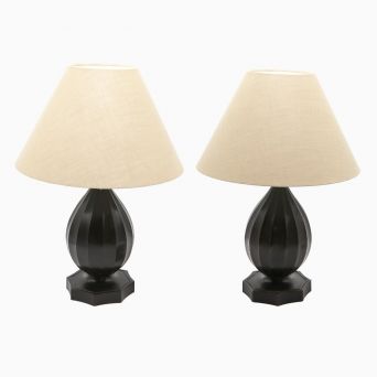 Pair of Art Deco table lamps in dark patinated diskometal. In original, perfect condition with mark on the base
