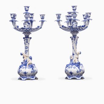A pair of blue fluted candelabras designed by Arnold Krog for the Royal Copenhagen, 1889-1922. 