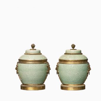Pair of French cachepots and covers. Chinese Celadon porcelain with gilded bronze fitting
